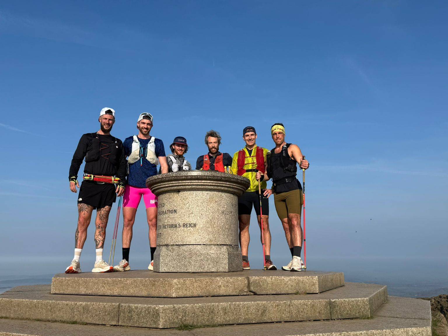 group of ultrarunners training together in mountains showing teamwork in ultrarunning